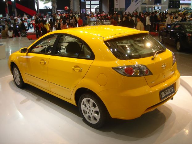 Китайская автофирма 6 букв. Китайская машина 2007 QQ. Китайская машина фат 50. Желтый китайский автомобиль. Китайские авто желтая.